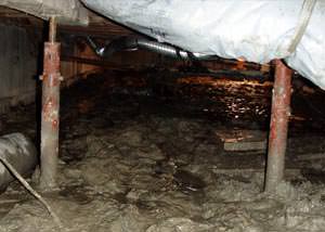 Old, corroded crawl space jack posts in Park City.