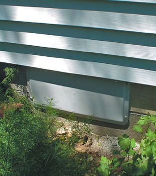 A gray crawl space vent cover in Riverton