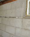Severely buckling foundation walls in a home in South Jordan in need of repairs.