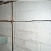 Severe foundation damage from a long crack in a bucking wall of a Bountiful home.