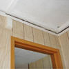 The ceiling and wall separating as the wall sinks with the slab floor in a American Fork home