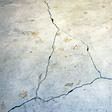 foundation heaving cracks in a slab floor in Draper
