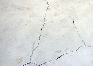 cracks in a slab floor consistent with slab heave in American Fork.