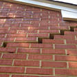 stair step cracking on a foundation wall in Price