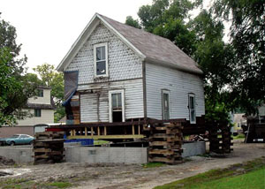 A severely damaged home foundation that is undergoing replacement in Lehi.