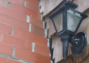 A tilting chimney in Riverton showing serious foundation damage.