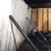 Temporary foundation wall supports stabilizing a Draper home