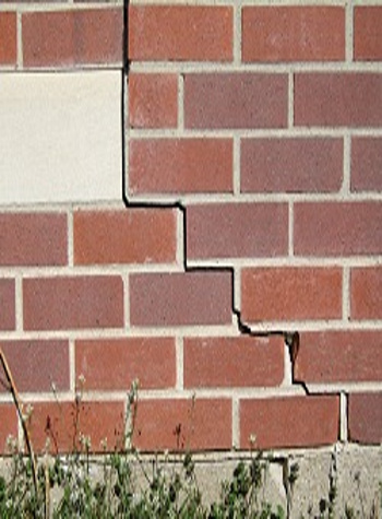 photo of a rotating foundation wall with cracks in Brigham City