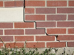 stair step cracking on a foundation wall in Price