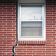 foundation cracks along a window in West Jordan