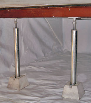 Crawl space jack posts installed in conjunction with a crawl space vapor barrier in Brigham City