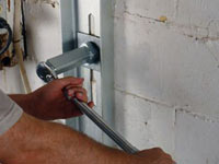 Mounting a foundation wall channel anchor in Tooele.