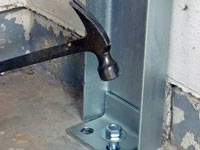 Mounting a foundation channel anchor installation to the floor in Tooele.