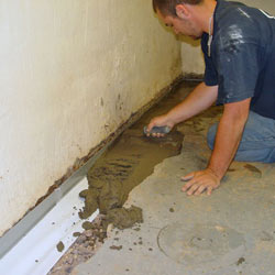 Testing a French drain system in a Layton home.