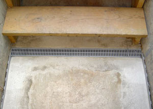 Our grated drain system installed on a leaking basement staircase in Brigham City.