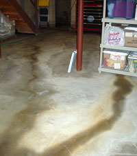 Flooding entering a basement through a floor crack in Cedar City