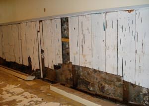 A wet, flooded finished basement in Midvale