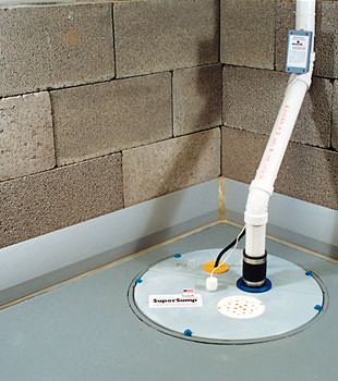 A baseboard basement drain pipe system installed in Layton