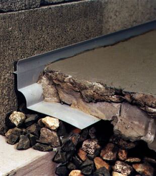 a custom designed basement drain system for thin basement floors in Lehi.