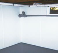 basement vapor barriers on the walls in a formerly leaky basement in Salt Lake City, UT