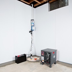 Sump pump system, dehumidifier, and basement wall panels installed during a sump pump installation in Bountiful